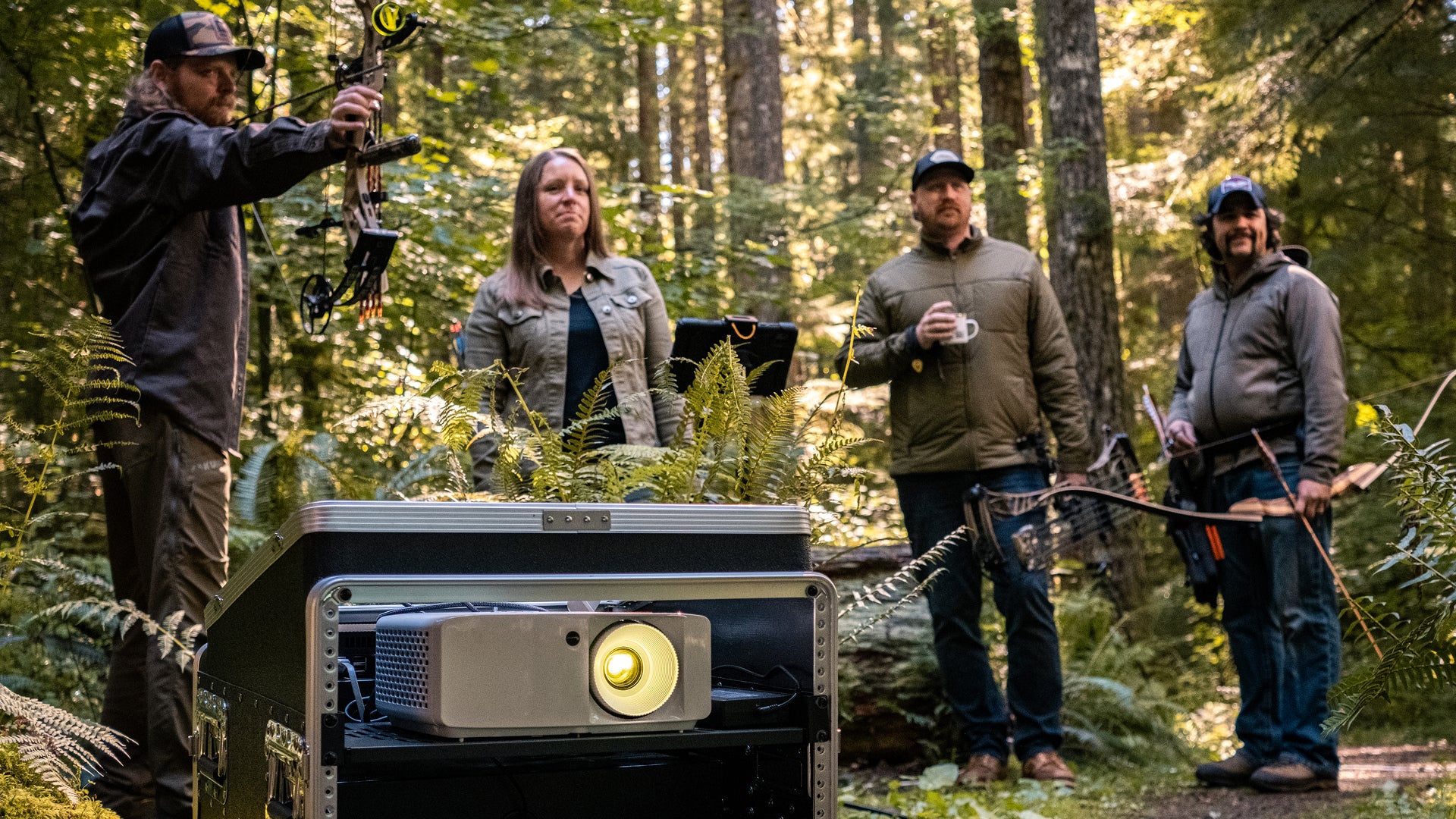 standing around the projector at the shooting line